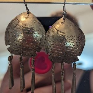 Silver hand detailed fish earrings